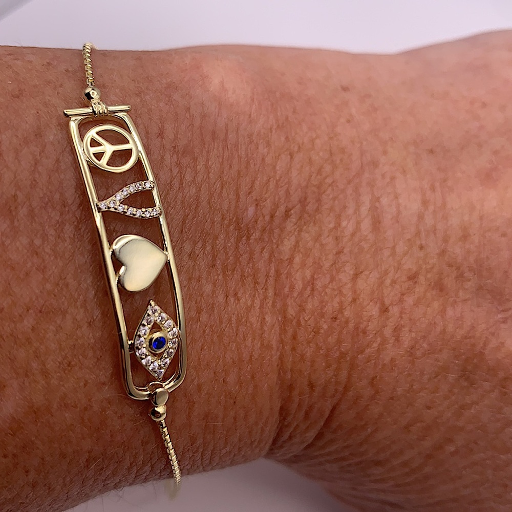 Gold Bracelet With Cartouche Bar Featuring Heart, Peace, Wishbone & Evil Eye